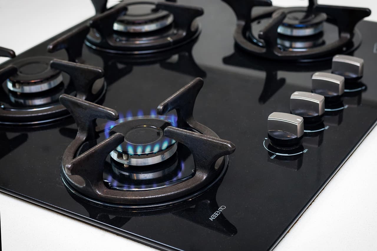 Gas hob with the burners lit