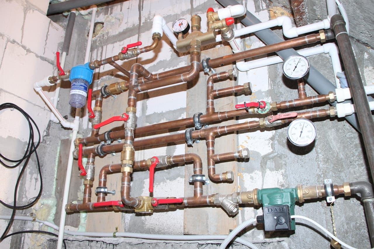 Copper hot water pipework with valves and gauges