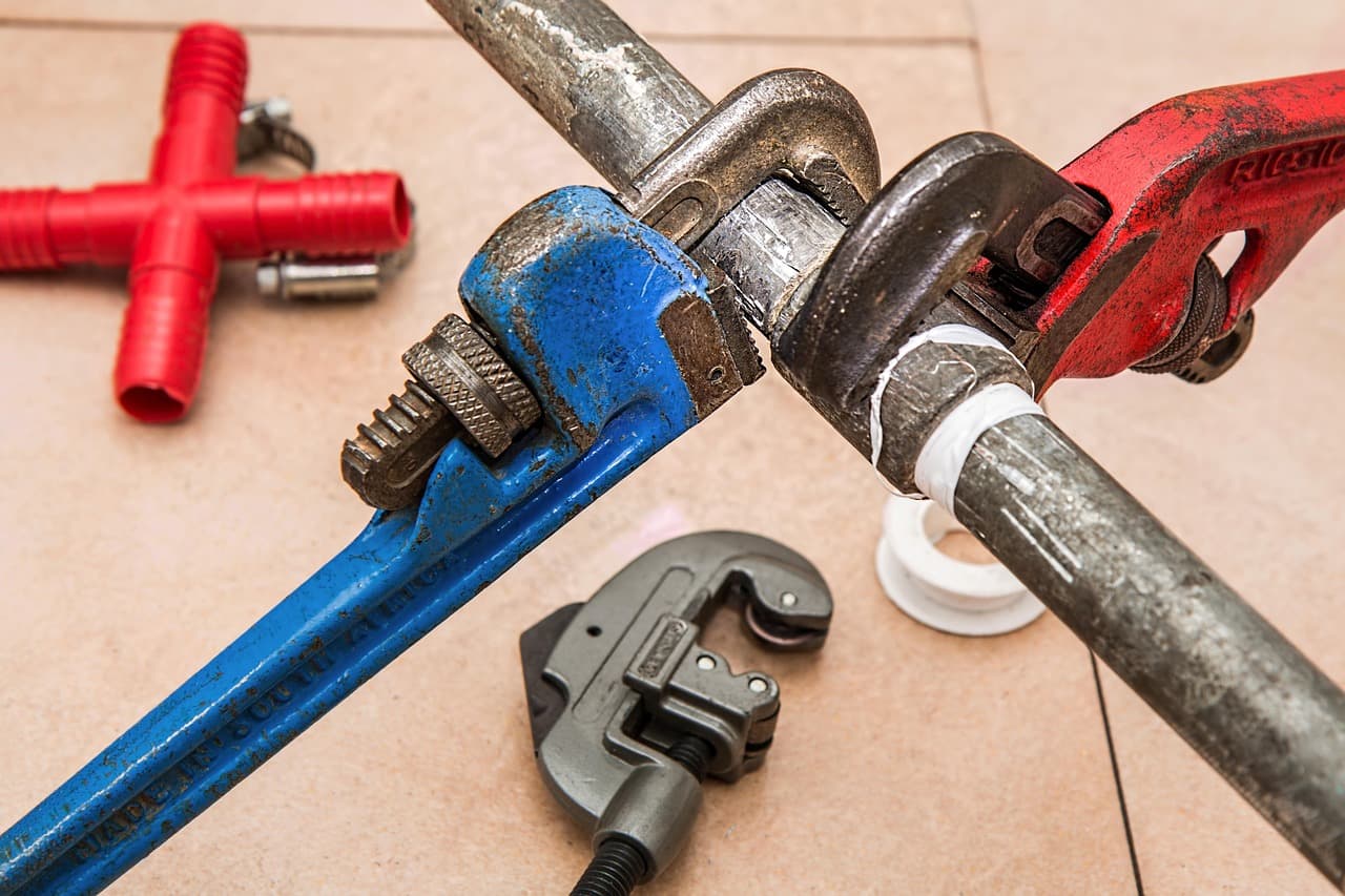 Pipe wrenches on a copper pipe